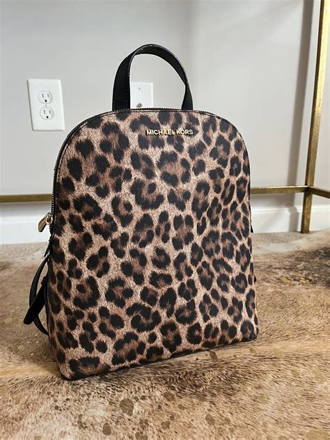 michael kors black cheetah backpack|cheetah print Michael Kors bag.